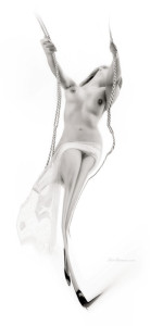 chica desnuda en hamaca